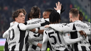 The players of Juventus celebrate a goal in Turin.